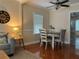 Dining area with hardwood floors and a table set with seating for four guests at 422 E Belmar St, Lakeland, FL 33803