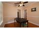 Charming dining area with a black dining table set and ceiling fan at 422 E Belmar St, Lakeland, FL 33803