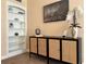 Living area featuring stylish console, built-in shelving, and modern decor accents at 422 E Belmar St, Lakeland, FL 33803