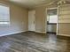 The living room features a front door, a window, and a doorway to the kitchen at 422 E Belmar St, Lakeland, FL 33803