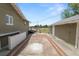 A brick patio leads to the back of the house and a detached garage at 5201 Dorman Rd, Lakeland, FL 33813