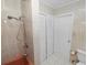 Bathroom with tiled walls and shower over tub with modern fixtures at 5201 Dorman Rd, Lakeland, FL 33813