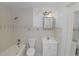 The primary bathroom with a tub and shower combination and single sink vanity at 5201 Dorman Rd, Lakeland, FL 33813
