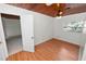 A well-lit bedroom features wood ceiling and floors and one window at 5201 Dorman Rd, Lakeland, FL 33813