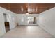 Bright living room featuring tile flooring, a ceiling fan, and ample natural light, creating a welcoming atmosphere at 5201 Dorman Rd, Lakeland, FL 33813