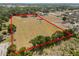 Aerial view showcasing the property's boundaries, lush landscape and vast potential for building your dream home at 5201 Dorman Rd, Lakeland, FL 33813