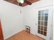 Cozy room with wood flooring and glass paneled door with natural light at 5201 Dorman Rd, Lakeland, FL 33813