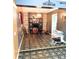 Warm living room features unique flooring, rustic-style shelving, and soft, ambient lighting at 5218 Parkland Ct, Lakeland, FL 33811