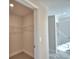 Walk-in closet with wire shelving for organized storage at 535 Tanaro Ln, Haines City, FL 33844