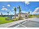 Community pool features shade pavilion, restrooms, plenty of parking, and lake views at 535 Tanaro Ln, Haines City, FL 33844