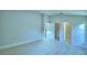 Bedroom with multiple doors and neutral carpet at 539 Tanaro Ln, Haines City, FL 33844