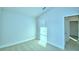 Bright bedroom featuring carpet, a closet, and neutral walls at 539 Tanaro Ln, Haines City, FL 33844