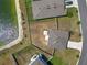 Bird's eye view of a backyard near the lake surrounded by other houses at 5463 Arlington River Dr, Lakeland, FL 33811