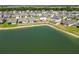 Panoramic aerial view of the property, nestled in a community with a large lake at 5463 Arlington River Dr, Lakeland, FL 33811