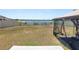 Open backyard showcasing a gazebo and a serene waterfront view, enclosed by a fence for privacy at 5463 Arlington River Dr, Lakeland, FL 33811