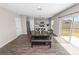 Dining room featuring wood floors, a dark wood table and a bench, all under recessed lighting at 5463 Arlington River Dr, Lakeland, FL 33811