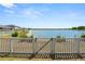 Gated access to a serene lake view with lush surroundings, offering privacy and natural beauty at 5463 Arlington River Dr, Lakeland, FL 33811