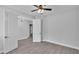 Spacious bedroom with tray ceiling and a view into the ensuite bathroom at 5508 Odom, Lakeland, FL 33809