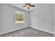 Bedroom with wood floors, window and ceiling fan at 5508 Odom, Lakeland, FL 33809