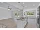 Kitchen island with marble countertops and stainless steel dishwasher in open concept home at 5508 Odom, Lakeland, FL 33809