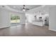 Open concept living area with tile floors and a modern kitchen, perfect for entertaining at 5508 Odom, Lakeland, FL 33809