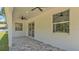 Covered patio with ceiling fans provides a comfortable outdoor living space at 5508 Odom, Lakeland, FL 33809