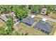 Overhead shot displays the two homes, their backyards, landscaping, and location in relation to the street at 5512 Odom Rd, Lakeland, FL 33809