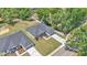 A top-down view of the property, showcasing its layout, landscaping, and proximity to surrounding neighborhood at 5512 Odom Rd, Lakeland, FL 33809