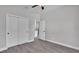 Bedroom with double closet, ceiling fan, neutral color scheme for creating comfortable, and relaxing space at 5512 Odom Rd, Lakeland, FL 33809