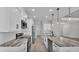 Spacious kitchen with stainless steel appliances, modern cabinetry, and granite countertops for a sleek design at 5512 Odom Rd, Lakeland, FL 33809