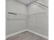 Corner view of walk-in closet with white wire shelving for optimal organization at 5512 Odom Rd, Lakeland, FL 33809