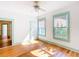 Sun-filled bedroom with hardwood floors, ample natural light, and fresh, neutral paint at 649 Ave J Nw, Winter Haven, FL 33881