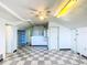 Bonus room with unique ceiling, fan, and checkered flooring at 649 Ave J Nw, Winter Haven, FL 33881