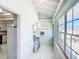 Laundry room with sink and exterior access at 649 Ave J Nw, Winter Haven, FL 33881