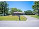 Charming single-Gathering home with a well-maintained lawn and paved driveway at 6529 Farris Dr, Lakeland, FL 33811