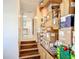 Basement storage area shows shelves filled with neatly organized boxes and bins, providing practical organization solutions at 737 Kensington St, Lakeland, FL 33803