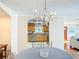 Open dining area with views into the living room and kitchen, perfect for entertaining at 737 Kensington St, Lakeland, FL 33803
