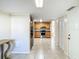 Open concept kitchen features stainless steel appliances, wood cabinets, and granite countertops at 737 Kensington St, Lakeland, FL 33803