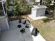 Aerial view of backyard featuring a detached garage and patio furniture at 746 Mississippi Ave, Lakeland, FL 33801