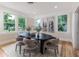 Bright dining room features a modern table, stylish chairs, and natural light at 746 Mississippi Ave, Lakeland, FL 33801