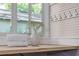 Bright laundry area offering generous counter space, storage and decor at 746 Mississippi Ave, Lakeland, FL 33801