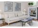 Cozy living room has neutral decor, stylish art, and an inviting atmosphere at 746 Mississippi Ave, Lakeland, FL 33801
