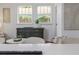 Light and bright living room featuring wood flooring, decorative rug, and natural light at 746 Mississippi Ave, Lakeland, FL 33801