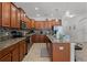 Well-equipped kitchen featuring a large island, stainless steel appliances, modern backsplash, and abundant counter space at 8929 Sugar Palm Rd, Kissimmee, FL 34747