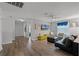 Open-concept living room with modern decor and abundant natural light at 8929 Sugar Palm Rd, Kissimmee, FL 34747