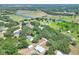 A cozy property is nestled among mature trees in a neighborhood with sprawling countryside and a river at 930 Country Oaks Ln, Lakeland, FL 33810