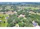 A well-situated home surrounded by mature trees in a quiet neighborhood with sprawling countryside at 930 Country Oaks Ln, Lakeland, FL 33810