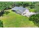 Well maintained home with large front yard, two car garage and screened in back porch at 930 Country Oaks Ln, Lakeland, FL 33810