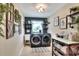 Well-lit laundry room with washer, dryer, utility sink and decorative shelving at 930 Country Oaks Ln, Lakeland, FL 33810