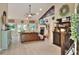 Warm living room with vaulted ceiling, fireplace, and comfortable seating at 930 Country Oaks Ln, Lakeland, FL 33810
